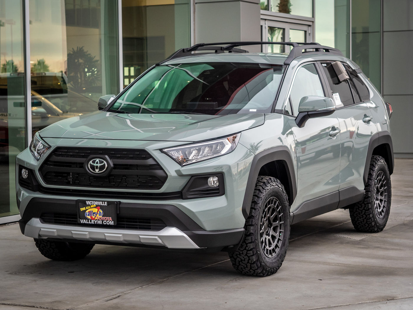 A Lunar Rock RAV4 Adventure on gunmetal Black Rhino Boxer mesh wheels and aggressive all-terrain tires