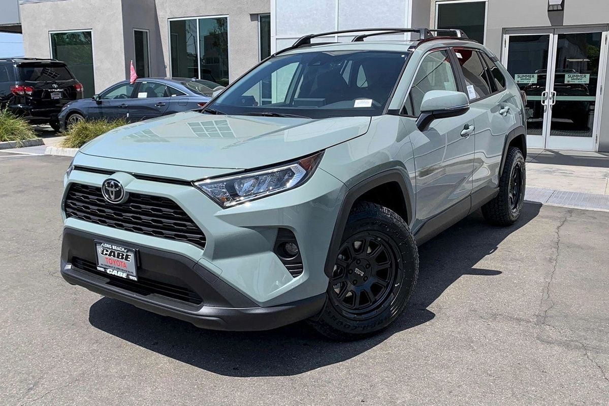 Front three-quarter view of the same Lunar Rock RAV4 on Black Rhino Chase wheels