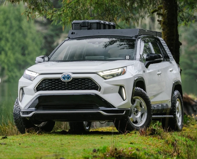Front view of the white RAV4 Prime on silver Black Rhino Sol wheels