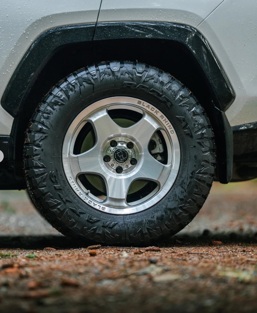 Close-up of the machined silver Black Rhino Sol wheel and Maxxis RAZR AT tire