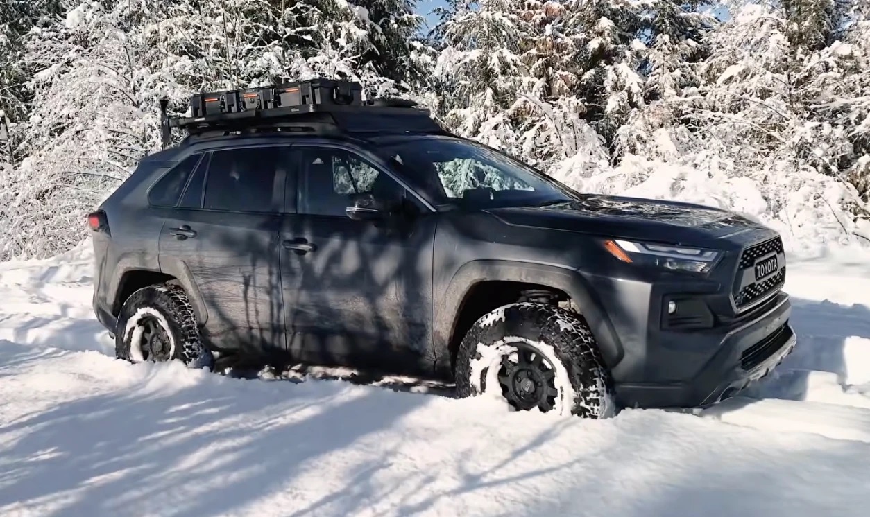 The same lifted RAV4 on Falken Wildpeak A/T tires in deep snow